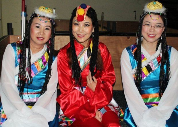 Waiting backstage in ethnic minority costume